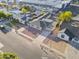 Aerial view highlighting the property's placement, driveway, landscaping, and street at 432 W 1St St, Mesa, AZ 85201