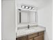 Bathroom vanity with decorative mirror and granite countertop at 432 W 1St St, Mesa, AZ 85201