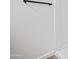 Bathroom detail with shower stall, wood grain flooring, and dark metal towel rack at 432 W 1St St, Mesa, AZ 85201