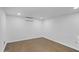 Empty bedroom with wood flooring, AC unit, and recessed lighting at 432 W 1St St, Mesa, AZ 85201