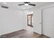 Bedroom featuring ceiling fan, closet, and sliding glass doors at 432 W 1St St, Mesa, AZ 85201