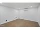 Minimalist room with hardwood floor, recessed lights, and air conditioning unit at 432 W 1St St, Mesa, AZ 85201