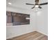 Bedroom with wood floors, and backyard view from window at 432 W 1St St, Mesa, AZ 85201