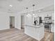 Modern kitchen with stainless steel appliances, granite countertops and open layout at 432 W 1St St, Mesa, AZ 85201