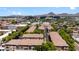 Aerial view of a townhome community with a mountain backdrop and lush landscaping at 4347 N 24Th Way, Phoenix, AZ 85016