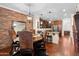 Elegant dining area with seating for six, chandelier, and access to kitchen at 4347 N 24Th Way, Phoenix, AZ 85016