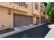 Townhome garages with brown doors, brick accents, and a well-maintained exterior at 4347 N 24Th Way, Phoenix, AZ 85016