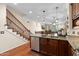 View of kitchen with granite counters, stainless steel appliances, and wood floors at 4347 N 24Th Way, Phoenix, AZ 85016