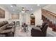 Stylish living room with fireplace, leather furniture, and a cozy atmosphere at 4347 N 24Th Way, Phoenix, AZ 85016
