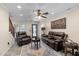 Comfortable living room with ample seating, ceiling fan, and bright natural light at 4347 N 24Th Way, Phoenix, AZ 85016