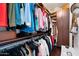 Spacious walk-in closet with ample storage, shelving and rods for hanging clothes at 4347 N 24Th Way, Phoenix, AZ 85016