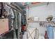 Walk-in closet featuring hanging clothes, shelves, and storage solutions for organized storage at 4396 N School Hill Rd, Buckeye, AZ 85396