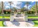 Welcoming entryway showcasing landscaping, flowerbeds, and a clear path to the community at 4396 N School Hill Rd, Buckeye, AZ 85396