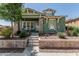 Charming two-story home with stone accents and well-maintained landscaping at 4396 N School Hill Rd, Buckeye, AZ 85396