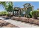Charming two-story home with stone accents and well-maintained landscaping at 4396 N School Hill Rd, Buckeye, AZ 85396