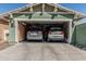 Organized two-car garage featuring ample storage and parking space for two vehicles at 4396 N School Hill Rd, Buckeye, AZ 85396