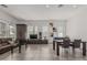 Spacious living room featuring tile floors and modern furnishings at 4396 N School Hill Rd, Buckeye, AZ 85396