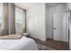 Bright bedroom featuring plush carpet, and ample natural light at 4580 E Gagarinite Ln, San Tan Valley, AZ 85143