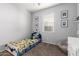 Fun ' bedroom with space theme and cozy chair at 4580 E Gagarinite Ln, San Tan Valley, AZ 85143