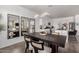 Open-concept dining area leading to the kitchen and living room at 4580 E Gagarinite Ln, San Tan Valley, AZ 85143