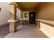 Inviting front porch featuring space for seating and a decorative front door at 4580 E Gagarinite Ln, San Tan Valley, AZ 85143