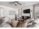 Cozy living room with modern decor and a large comfortable sectional sofa at 4580 E Gagarinite Ln, San Tan Valley, AZ 85143