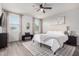 Serene main bedroom with neutral tones, large windows, and comfortable seating at 4580 E Gagarinite Ln, San Tan Valley, AZ 85143