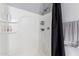 Bright shower stall featuring integrated shelves and a modern shower head at 4580 E Gagarinite Ln, San Tan Valley, AZ 85143