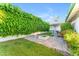 Lush backyard featuring a fire pit and manicured greenery, creating a private retreat at 4596 E Calle Ventura --, Phoenix, AZ 85018