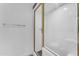 A bright shower with white subway tile and a glass door at 4596 E Calle Ventura --, Phoenix, AZ 85018