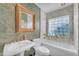 Bathroom featuring a bathtub and a modern sink and faucet at 4596 E Calle Ventura --, Phoenix, AZ 85018