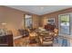 Elegant dining room boasts a glass-top table, stylish seating, and decorative mirror at 4596 E Calle Ventura --, Phoenix, AZ 85018