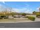 An exterior front view of a single story house with a manicured front yard and mature landscaping at 4596 E Calle Ventura --, Phoenix, AZ 85018