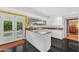 Modern kitchen features white cabinets, granite countertops, and stainless steel appliances at 4596 E Calle Ventura --, Phoenix, AZ 85018