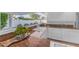 Bright kitchen features white cabinets, granite countertops, and a view of the backyard pool at 4596 E Calle Ventura --, Phoenix, AZ 85018