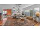Bright living room with hardwood floors, cozy seating, and large windows for natural light and great views at 4596 E Calle Ventura --, Phoenix, AZ 85018