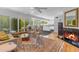 Elegant living room featuring a fireplace, plush seating, and ample natural light at 4596 E Calle Ventura --, Phoenix, AZ 85018