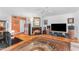 Cozy living room with a fireplace, hardwood floors, and ample space for entertaining friends and Gathering at 4596 E Calle Ventura --, Phoenix, AZ 85018