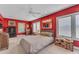 Spacious bedroom with hardwood floors, natural light, and ample closet space, providing comfort and style at 4596 E Calle Ventura --, Phoenix, AZ 85018