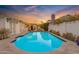 Backyard oasis featuring a sparkling swimming pool, perfect for relaxation and entertainment at 4596 E Calle Ventura --, Phoenix, AZ 85018