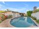 Beautiful backyard pool area featuring lush landscaping, perfect for enjoying sunny days at 4596 E Calle Ventura --, Phoenix, AZ 85018
