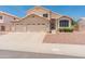 Charming two-story home with a three-car garage and well-maintained landscaping at 4746 W Taro Dr, Glendale, AZ 85308