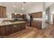 Open kitchen design with granite countertops, stainless steel appliances, and plenty of cabinets and counter space at 4746 W Taro Dr, Glendale, AZ 85308