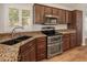 Well-equipped kitchen with stainless steel appliances and granite counters at 4746 W Taro Dr, Glendale, AZ 85308