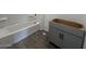 Bathroom features a tub and vanity sink at 47692 W Moeller Rd, Maricopa, AZ 85139