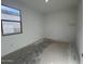 This is a sunlit bedroom with a bright window at 47692 W Moeller Rd, Maricopa, AZ 85139