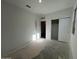 Bedroom features a large closet and neutral paint scheme at 47692 W Moeller Rd, Maricopa, AZ 85139