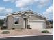 Charming single-story home featuring a two-car garage and low maintenance landscaping at 47692 W Moeller Rd, Maricopa, AZ 85139