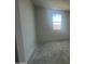 Empty bedroom with window ready for decor at 47719 W Moeller Rd, Maricopa, AZ 85139