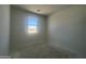 Bright bedroom with sunlit window offers a serene space at 47719 W Moeller Rd, Maricopa, AZ 85139